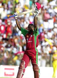 Wavell Hinds of the West Indies raises his bat after reaching his second consecutive century