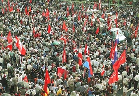 Students and opposition members shout slogans