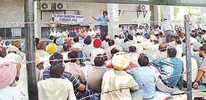 Employees of the BSNL from different parts of Punjab and Chandigarh hold a dharna in support of their demands in Chandigarh