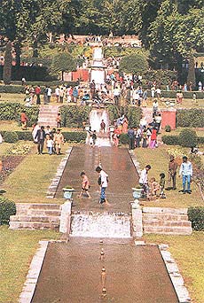 Tourists at the Mughal Gardens on the banks of the Dal lake in Srinagar.