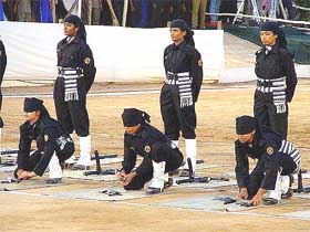 Cadets of the Women Commando Force display their skills