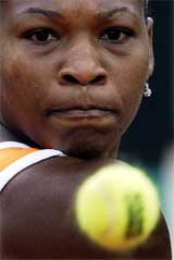 Serena Williams of the US eyes the ball during her match against Amelie Mauresmo of France