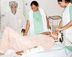 Gulzar Kaur (45), one of those injured in a mishap that took place on the Landran-Banur road, at the Civil Hospital, Kharar, on Wednesday.