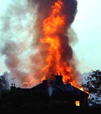 The 100-year-old Accountancy Training Institute building in flames 
