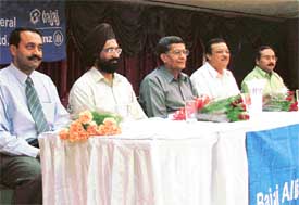 Officials of Bajaj Allianz and members of Knitwear Club, Ludhiana, at a workshop on risk management organised