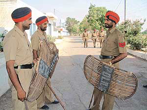 Police personnel in front of Shahid Baba Nihal Singh�s �samadh�