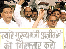 Activists of the Delhi unit of the Nationalist Congress Party holding a dharna in protest against the gruesome murder of the NCP Treasurer of the Chhattisgarh unit. They were demanding the arrest of the Chief Minister of Chattisgarh, Mr Ajit Jogi, and his son at Jantar Mantar in the Capital on Friday. 