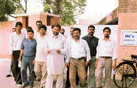 Dalit leaders emerge from the Deputy Commissioner�s residence after submitting a memorandum to him regarding the Talhan violence