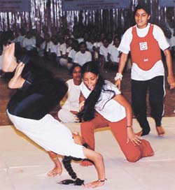 Women trained in self-defence display their skills at Talkatora Stadium