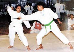 A school girl taking part in a self-defence training programme