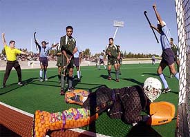 India's Baljit Saini and Gagan Ajit Singh celebrate a goal
