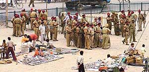 Policemen keep a vigil at Basti Jodhewal Chowk in Ludhiana