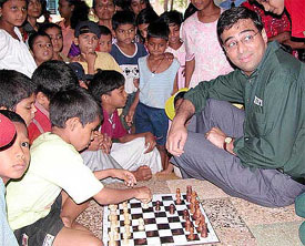 Grand Master Vishwanathan Anand spends some time with the underprivileged children 