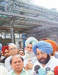 The Punjab Chief Minister, Capt Amarinder Singh, Mr Bir Devinder Singh and Chaudhary Jagjit Singh arrive at the Ranbaxy factory in SAS Nagar on Thursday. A Tribune photograph