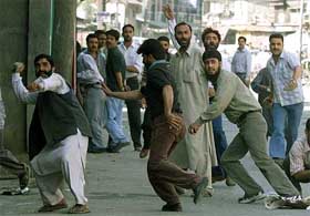 JKLF supporters hurl stones at the police