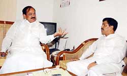 BJP President Venkaiah Naidu talks to party's all India General Secretary  Pramod Mahajan