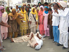 Women of Dhobiana Basti, whose dwellings were demolished by PUDA on June 7, demonstrate near the office of the Deputy Commissioner 