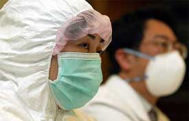 Chang Wen-hua, a nurse at Taipei's Ho Ping Municipal Hospital who recovered from SARS, speaks at a news conference about her experience in fighting the disease