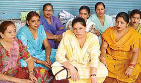 Ministerial employees of the Punjab Education Department sit in dharna in support of their demands outside the DPI office, Sector 17, Chandigarh on Friday. 