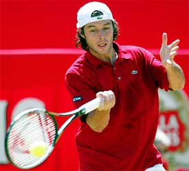 France's Sebastien Grosjean in action against Australia's Lleyton Hewitt