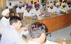 Mr Anurag Verma, DC-cum-District Election Officer, addresses a meeting on the forthcoming panchayat elections
