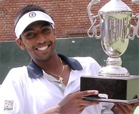 Prakash Amritraj poses with the trophy after winning the CLTA ITF Satellite tournament at the CLTA courts