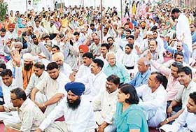 Members of the Sarav Dharam Sabha hold a rally in protest against demolition of religious structures on the PGI campus in Chandigarh