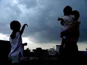 Children take a respite from the scorching heat