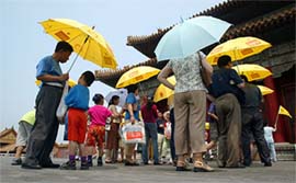 Tourists visit the Forbidden City in Beijing
