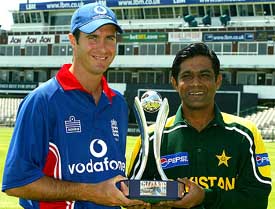 England's one-day captain Michael Vaughan and his Pakistani counterpart Rashid Latif hold the Natwest Challenge trophy