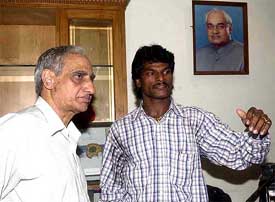 Union Minister for Youth Affairs and Sports Vikram Verma with Indian hockey captain Dhanraj Pillai 