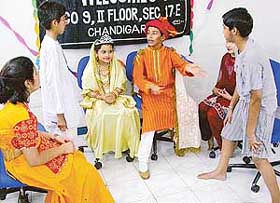 Children perform during the concluding function of the kids summer camp-2003 at Trainers Den in Sector 17, Chandigarh, on Tuesday. 