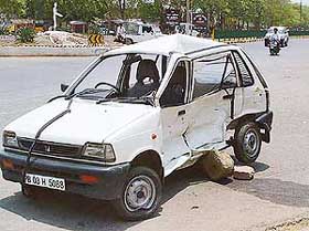 The badly damaged left side of a car which collided with another car near the Airport Chowk in Chandigarh on Tuesday. 