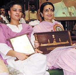 Kiran Choudhary with her daughter after receiving the Best MLA Award in the Capital