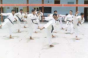 The Indian karate team at a practice session at DAV Senior Secondary School, Sector 8,Chandigarh, to prepare for the 4th World Karate Championship to be held at St Petersburg in Russia