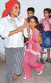 Children perform during the final presentation of Kids Fiesta in Traffic Park Auditorium