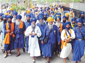 Shiromani Panth Akali members on their way to meet police officials in the SSP's office to protest against the sale of drugs