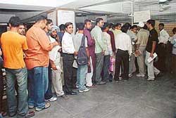 Students queue up at an SBI fee counter