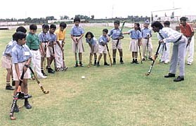 India�s hockey international Dhanraj Pillay explains the finer points of the game to the children of The Heritage School in Gurgaon. 
