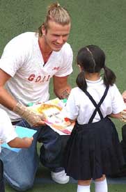 English football star David Beckham receives his likeness
