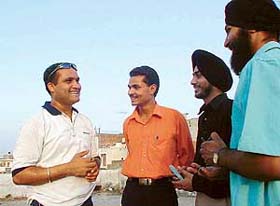 Jiwan, who resembles India’s star batsman Virender Sehwag, shares his Mumbai experiences with old friends in Ludhiana