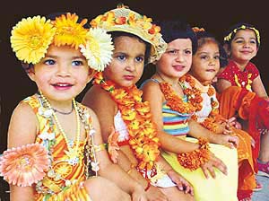 Tiny tots of Hollyhock Nursery School wait to perform at the concluding day of a summer camp at their school in Ludhiana