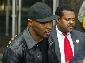 Former heavyweight boxing champion Mike Tyson leaves the 84th Precinct Station House in the borough of Brooklyn, New York, on Saturday