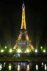 The Eiffel Tower, with its 20,000 new light bulbs linked by 25 miles of illuminated garlands, is seen in Paris