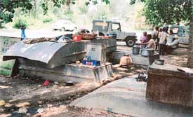 Aluminium boats meant to be used during floods are being used as tables by tea-stall owners near Mini Secretariat