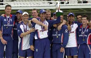 A jubilant England team poses with the NatWest Challenge trophy at the lord's