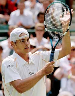 Andy Roddick of the US celebrates his victory over Italy's Davide Sanguinetti