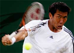 Thailand's Paradorn Srichaphan returns to Dominik Hrbaty of Slovakia