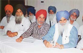 Mr Ajmer Singh Lakhowal and Prof Manjit Singh Qadian, president and secretary-general, BKU