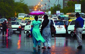Delhi is still waiting for the real thing as pre-monsoon showers lashed the Capital on Tuesday